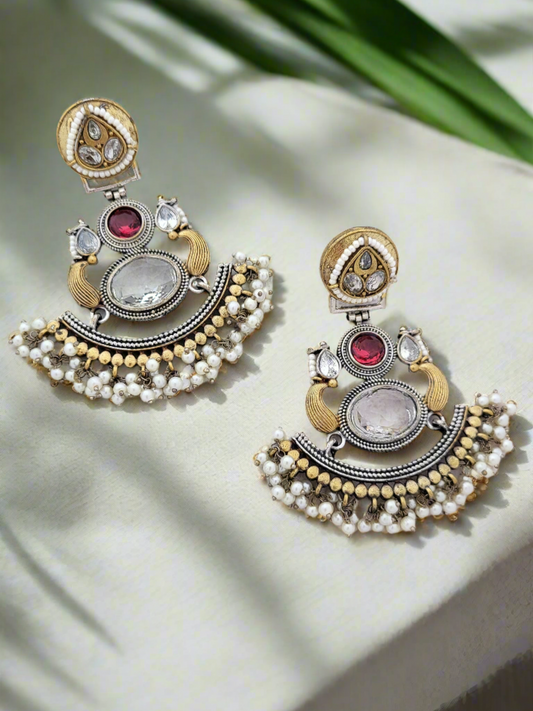 Two tone earrings with stone and pearl