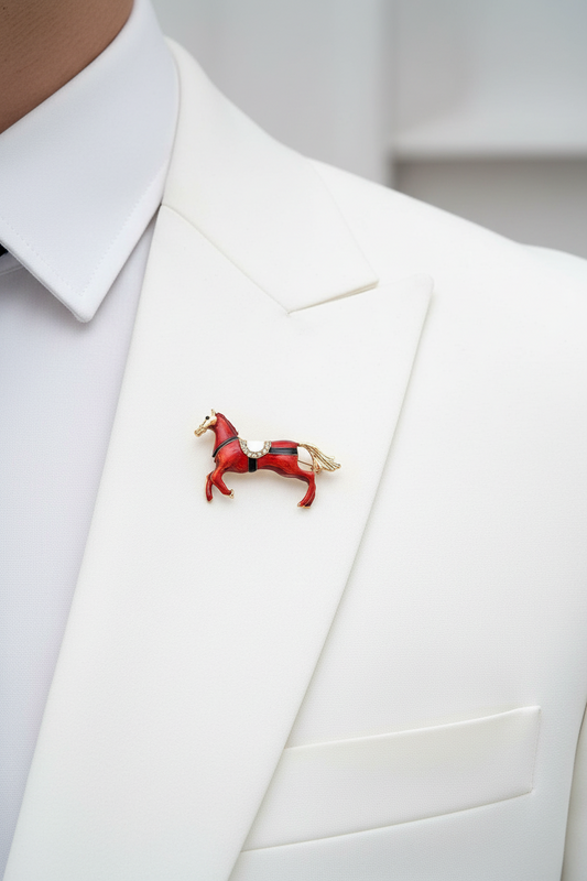 Gold-Tone Equestrian Brooch with Crystal Saddle