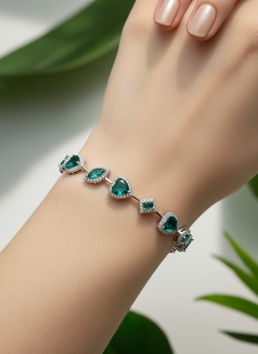 Emerald green multi- cut stone bracelet with diamonds