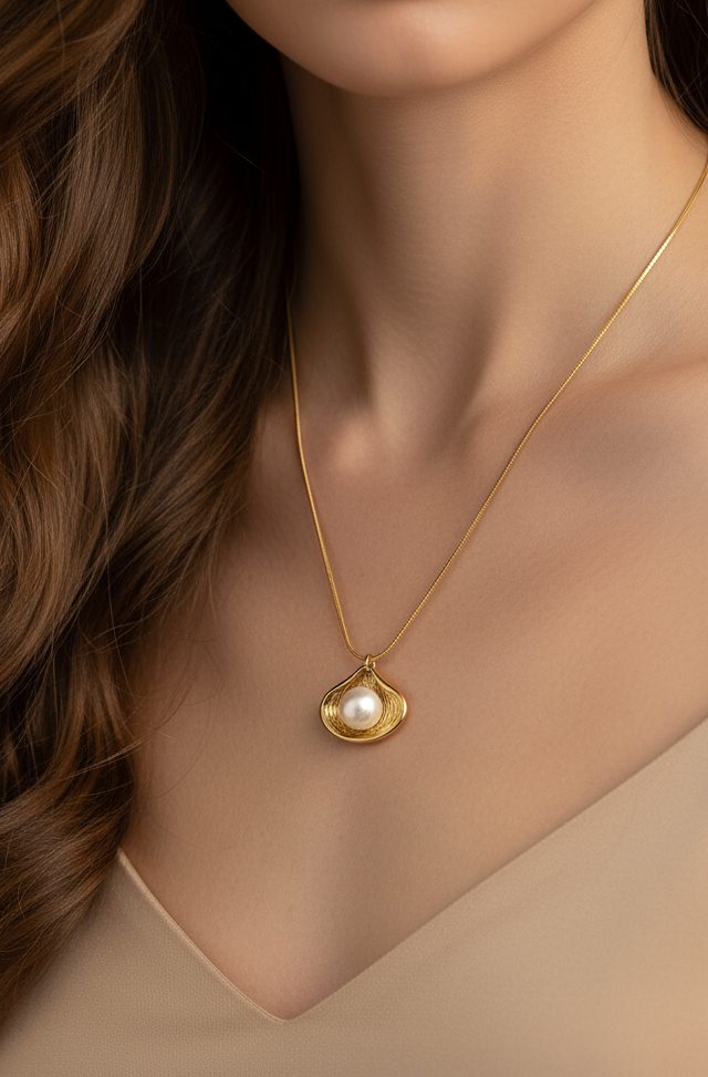 Anti tarnish gold plated open oyster with pearl.