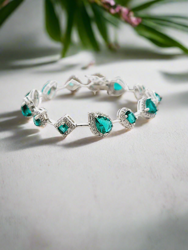 Emerald green multi- cut stone bracelet with diamonds