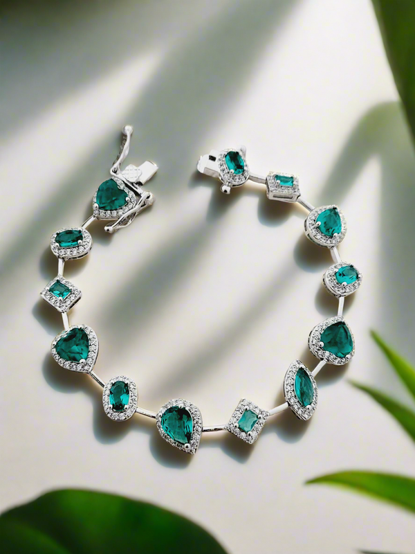 Emerald green multi- cut stone bracelet with diamonds